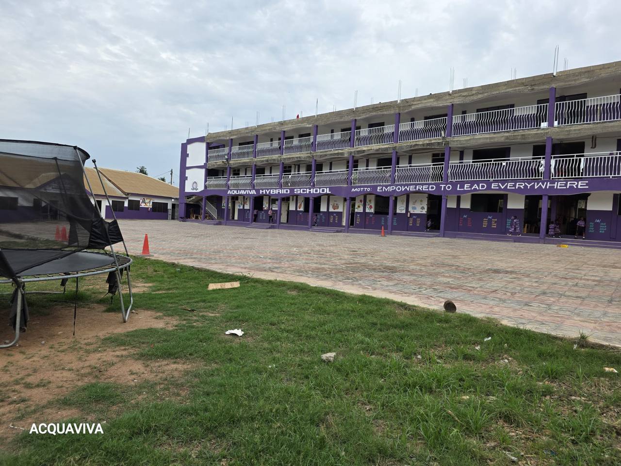 AquaViva school building and field side view